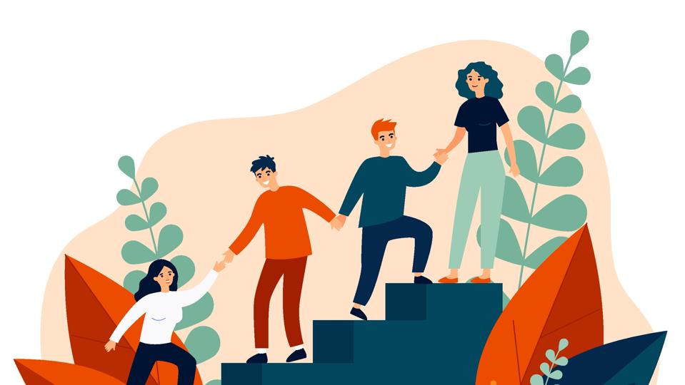 Happy young employees giving support and help each other