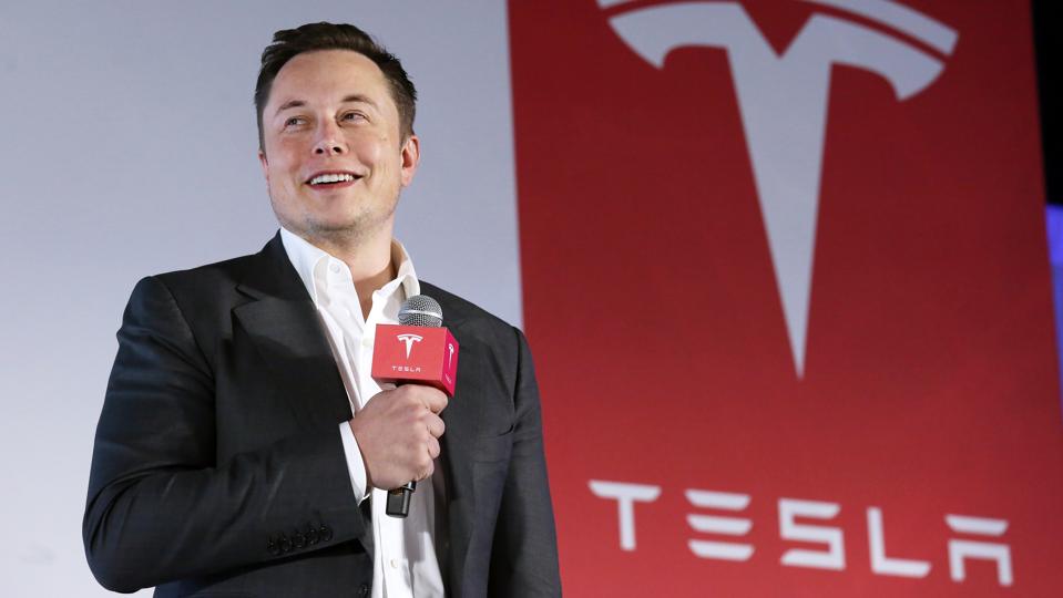Tesla Motors CEO Elon Musk speaks to the media