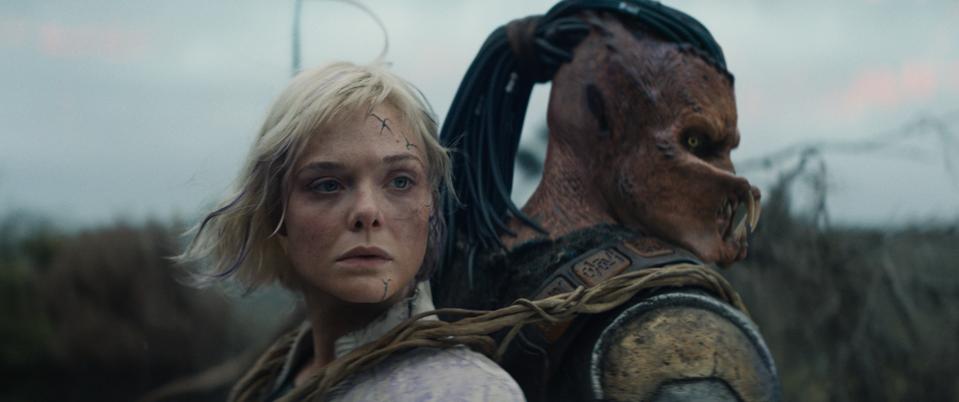 Elle Fanning and Dimitrius Schuster-Koloamatangi in "Predator: Badlands."