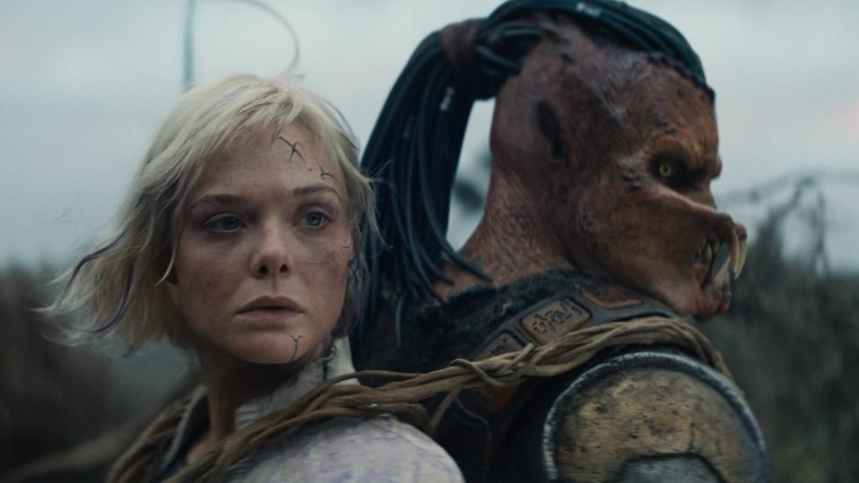 Elle Fanning and Dimitrius Schuster-Koloamatangi in "Predator: Badlands."