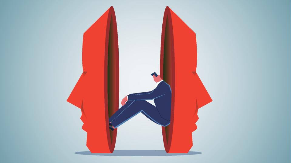 Low self-esteem, sadness, mental health, mental illness, anxiety or loneliness, psychology, social phobia, negativity, disappointment upset businessman sitting listlessly between two masks