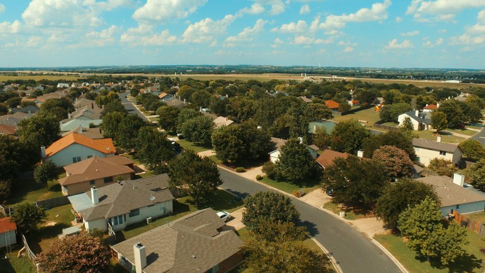 Aerial View Of Town Against Sky