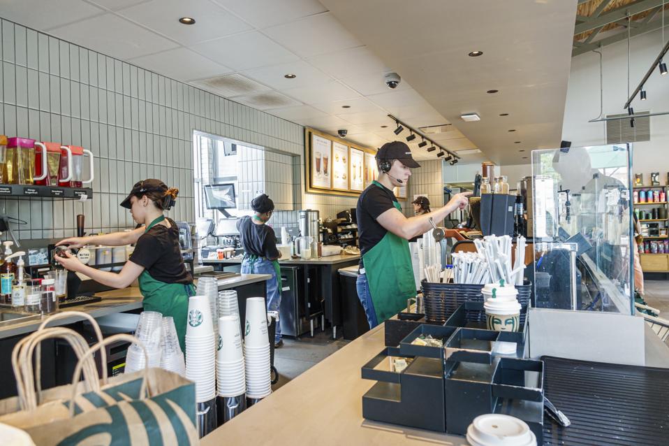 Augusta, Georgia, Starbucks Coffee, Baristas at work making drinks