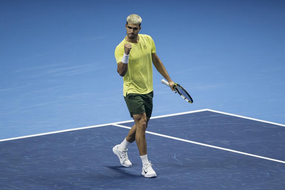 Carlos Alcaraz of Spain celebrates during his round robin…