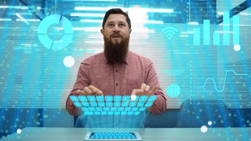 Professional man typing on holographic keyboard, with AI data visuals, upgrading resume