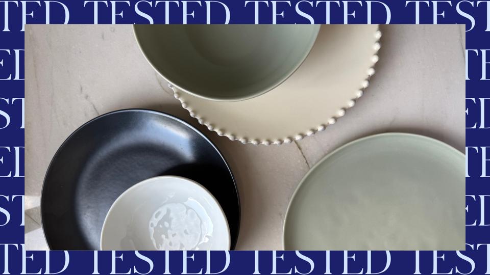 An assortment of dinnerware on a white table