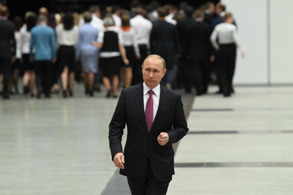 Russian President Vladimir Putin walks after his annual 'Direct Line with Vladimir Putin broadcast live' by Russian TV channels and radio stations at the Gostiny Dvor studio in Moscow on June 15, 2017. Russian President Vladimir Putin walks after his annual 'Direct Line with Vladimir Putin broadcast live' by Russian TV channels and radio stations at the Gostiny Dvor studio in Moscow on June 15, 2017.
