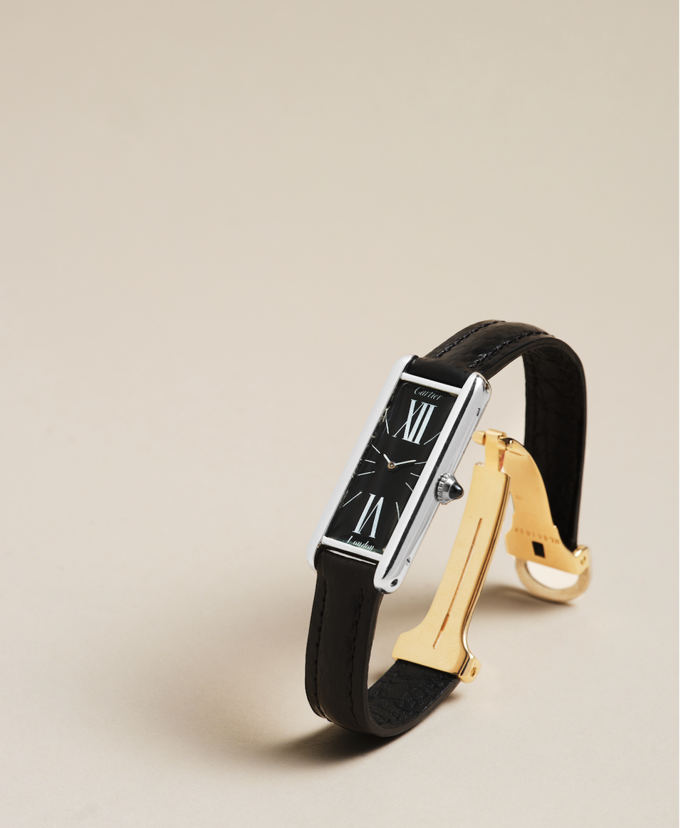 Cartier Tank J.J.C Allongée, London, gold rectangular watch. Estimate: $40,000-60,000