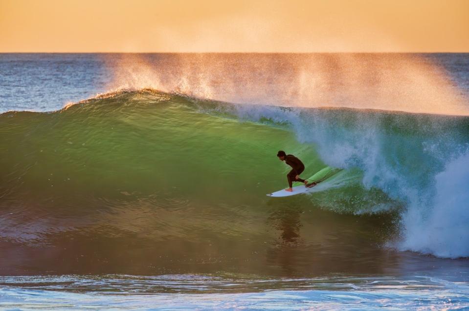 Surfer Riding a Wave