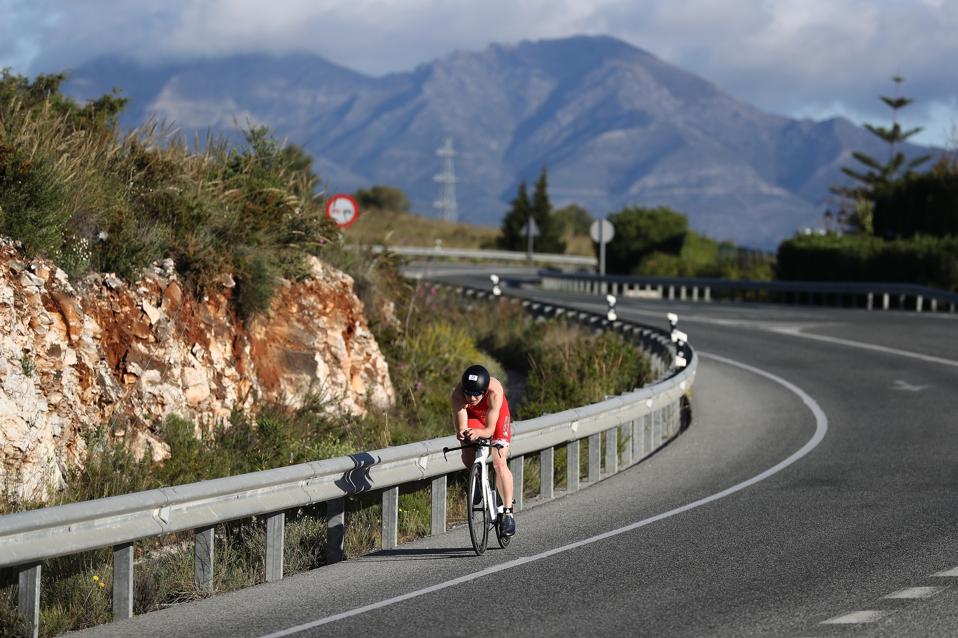 cyclist on mountain road