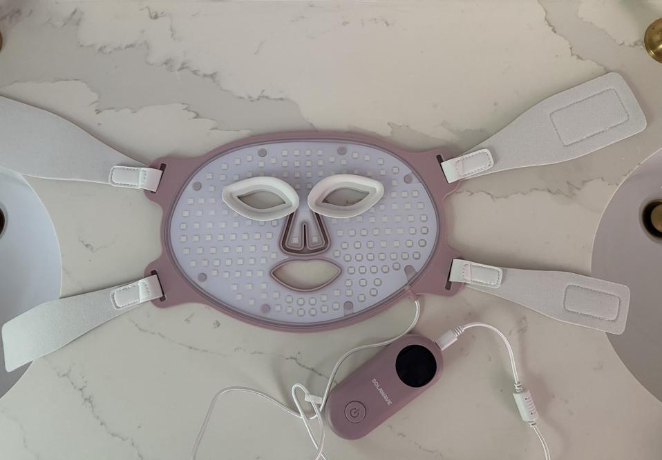 face mask vibrating circulation massager TheraFace Mask Glo with Vibration Therapy