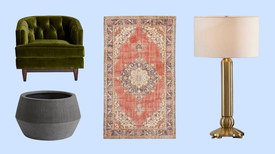 Green accent chair, gray planter, patterned area rug and gold lamp on blue background.