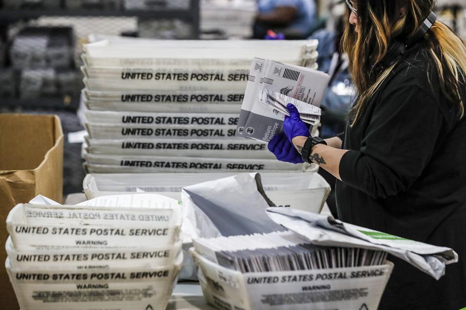 Judge Allows USPS Mail-In Ballot Rule To Take Effect—For Now