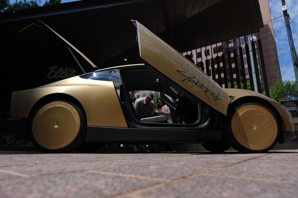 Forbes Daily: Tesla Debuts The Cybercab Amid Its Robotaxi Ambitions