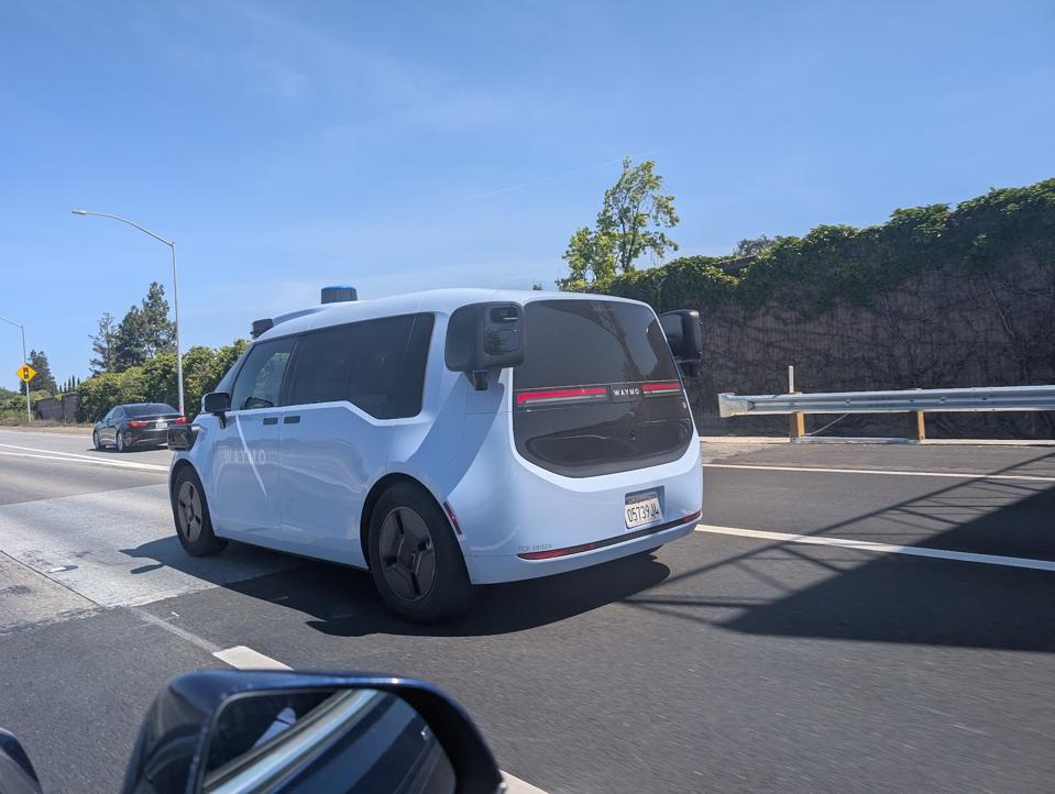Robotaxis Accused Of Deadheading, Curb/Charger Hogging.  Is That Fair?