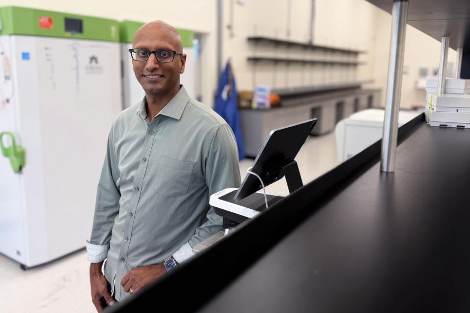 Photo of ChronicleBio CEO Rohit Gupta in the lab