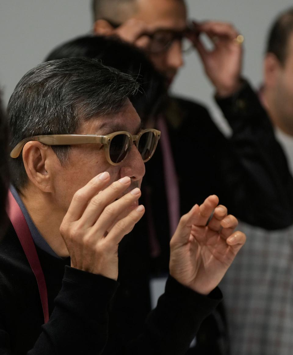 Attendees try on glasses at the Meta Connect developer conference, 09222026, in Menlo Park