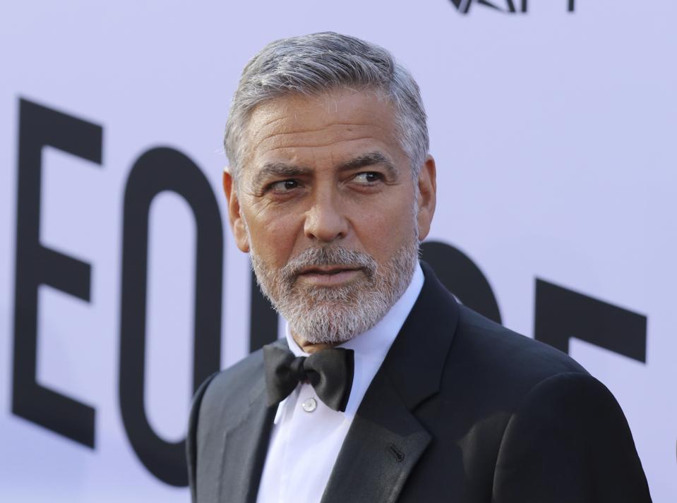 ″We have never heard of this summit and have never been approached to be part of a charity that is charging 399.00 for people to participate,″ George Clooney said in a statement to Forbes.