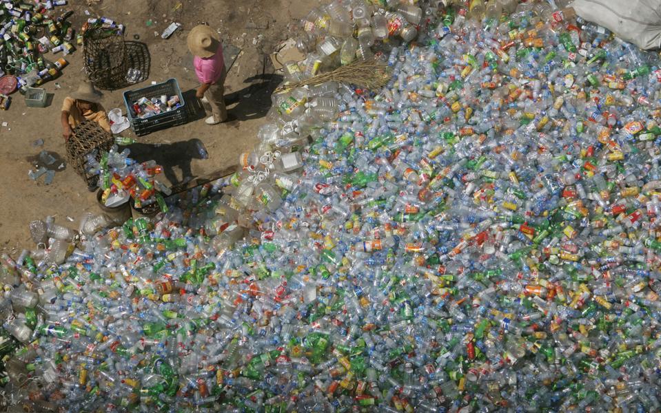 Migrant Workers Labour At Cycle Disposal Site In Beijing