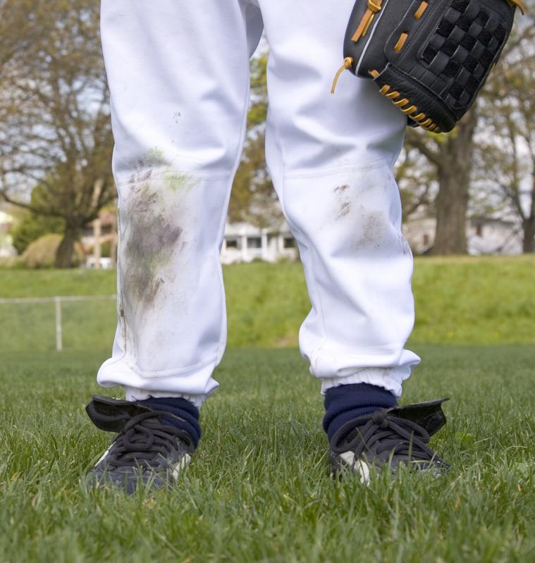 Young boy's dirty baseball uniform