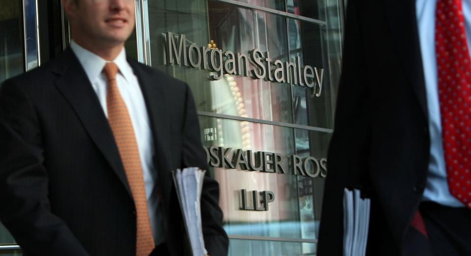 Workers walk out of Morgan Stanley headquarters in Times Square.