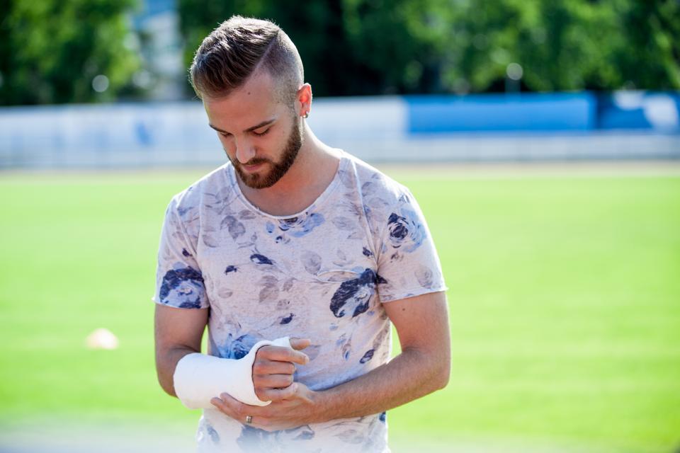Portrait of Athlete with Broken Arm