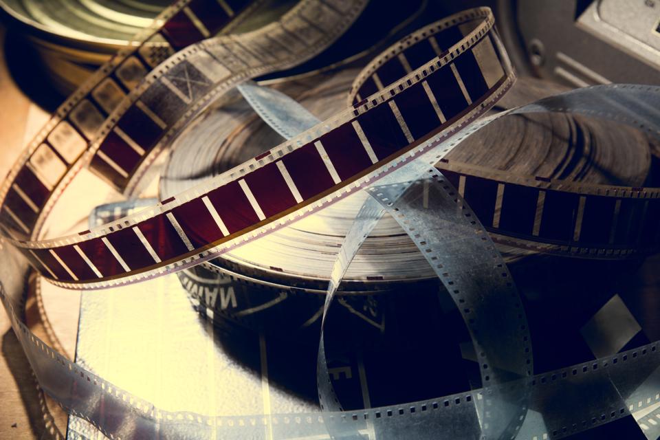 An old film with a movie on the roll.