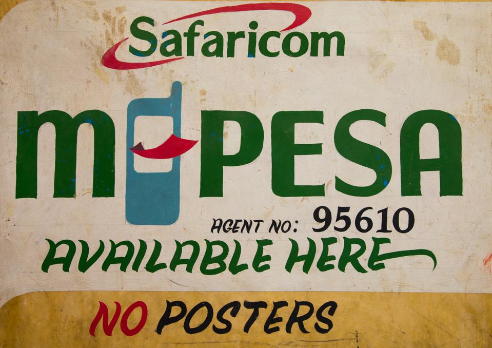 An advertising bilboard for safaricom telecom company mobile payment called mpesa, Lamu County, Lamu Town, Kenya...