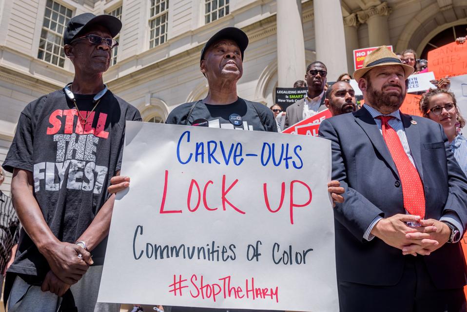 Advocates, community organizations, and Council Members held...
