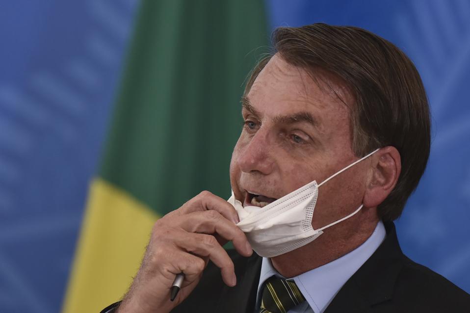 Brazil S Bolsonaro Blasted For Coronavirus Response As Twitter Facebook Remove Post